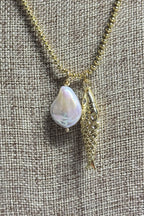FISH AND PEARL ABSTRACT NECKLACE
