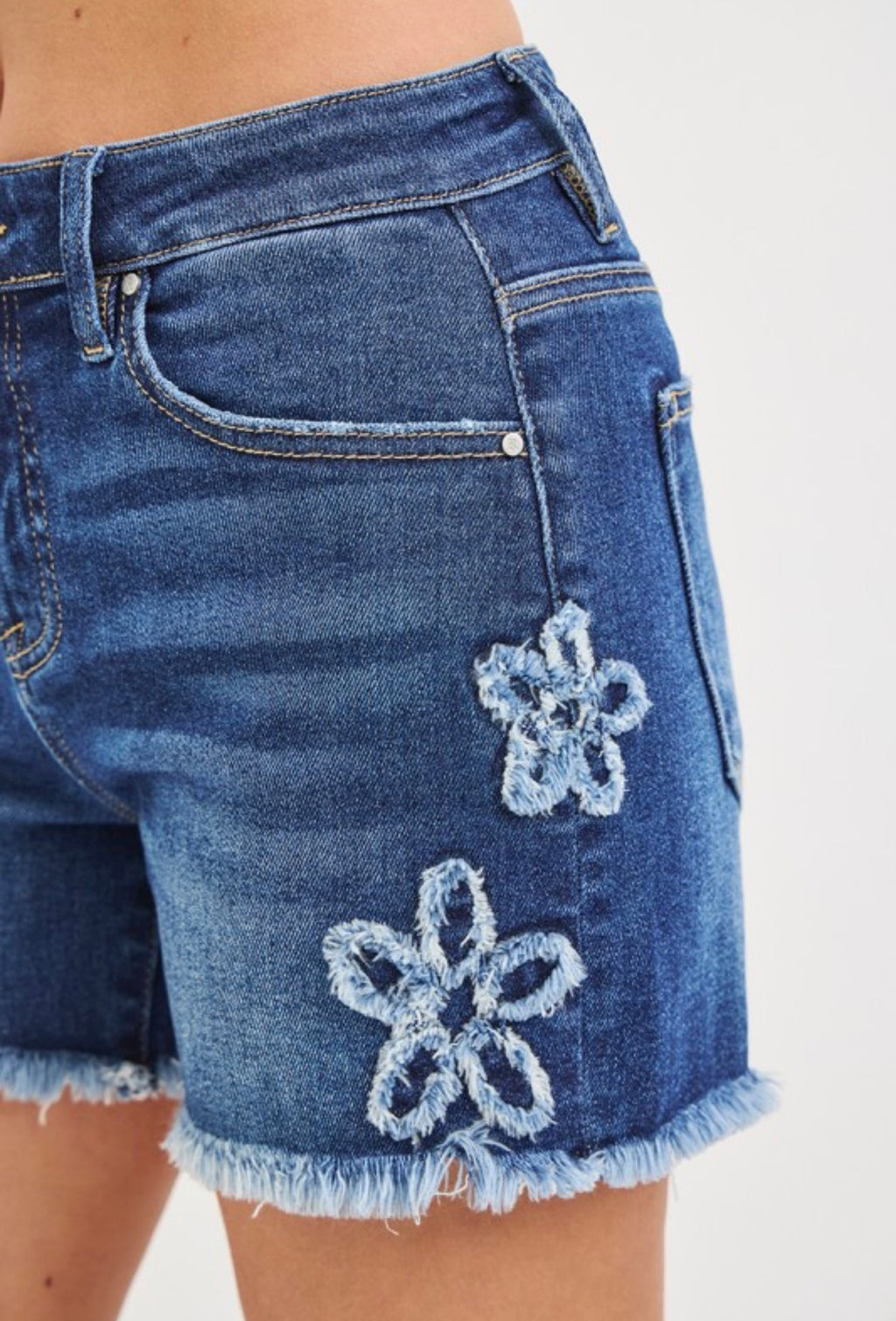 RISEN FLORAL DISTRESSED DENIM SHORTS