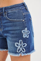 RISEN FLORAL DISTRESSED DENIM SHORTS