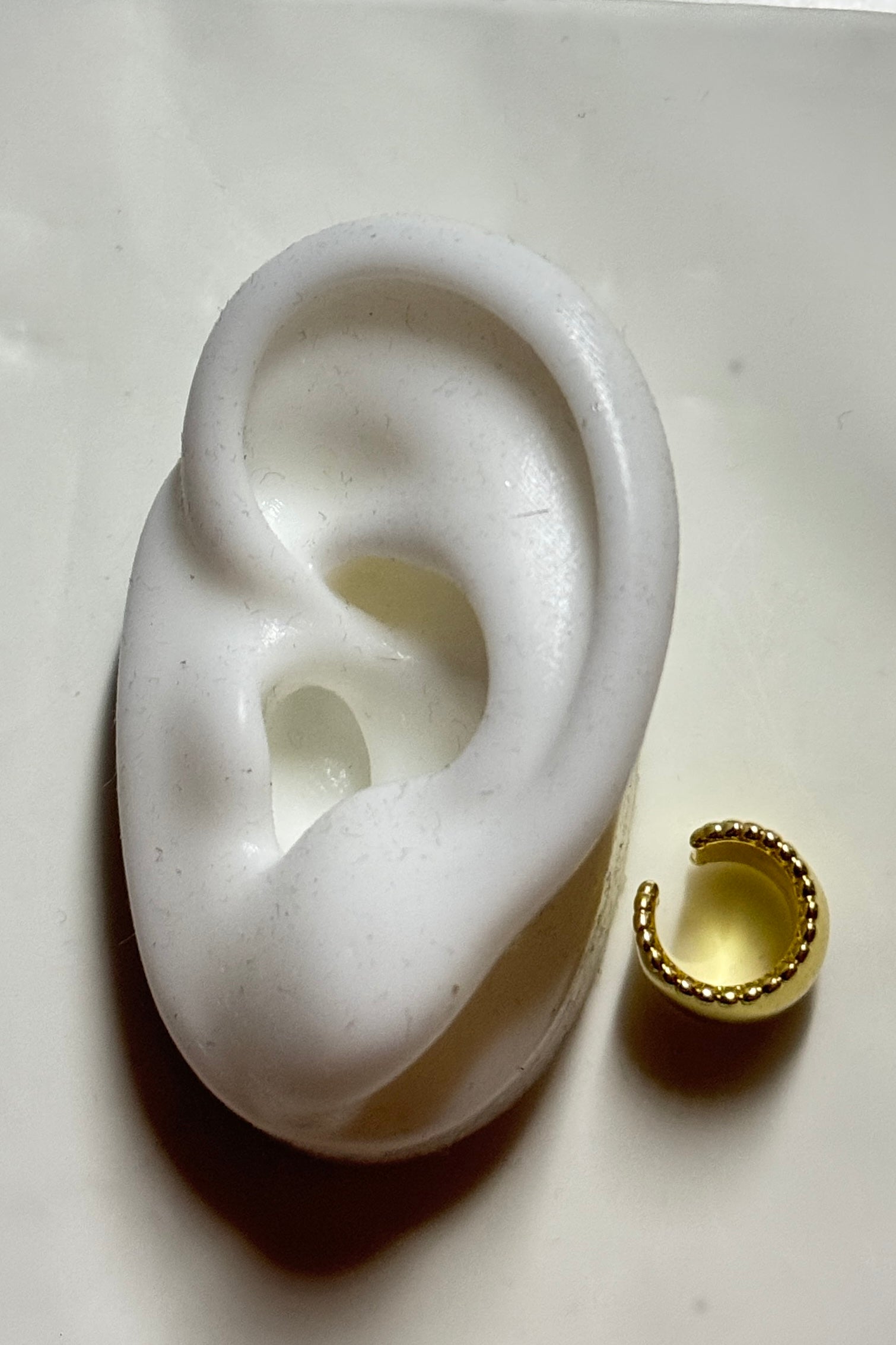 REGINA EARCUFF